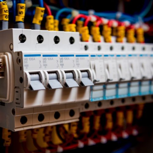 Voltage switchboard with circuit breakers. Electrical background